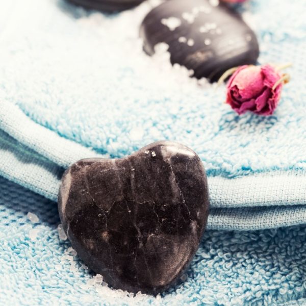 Close up of bath towels and stones
